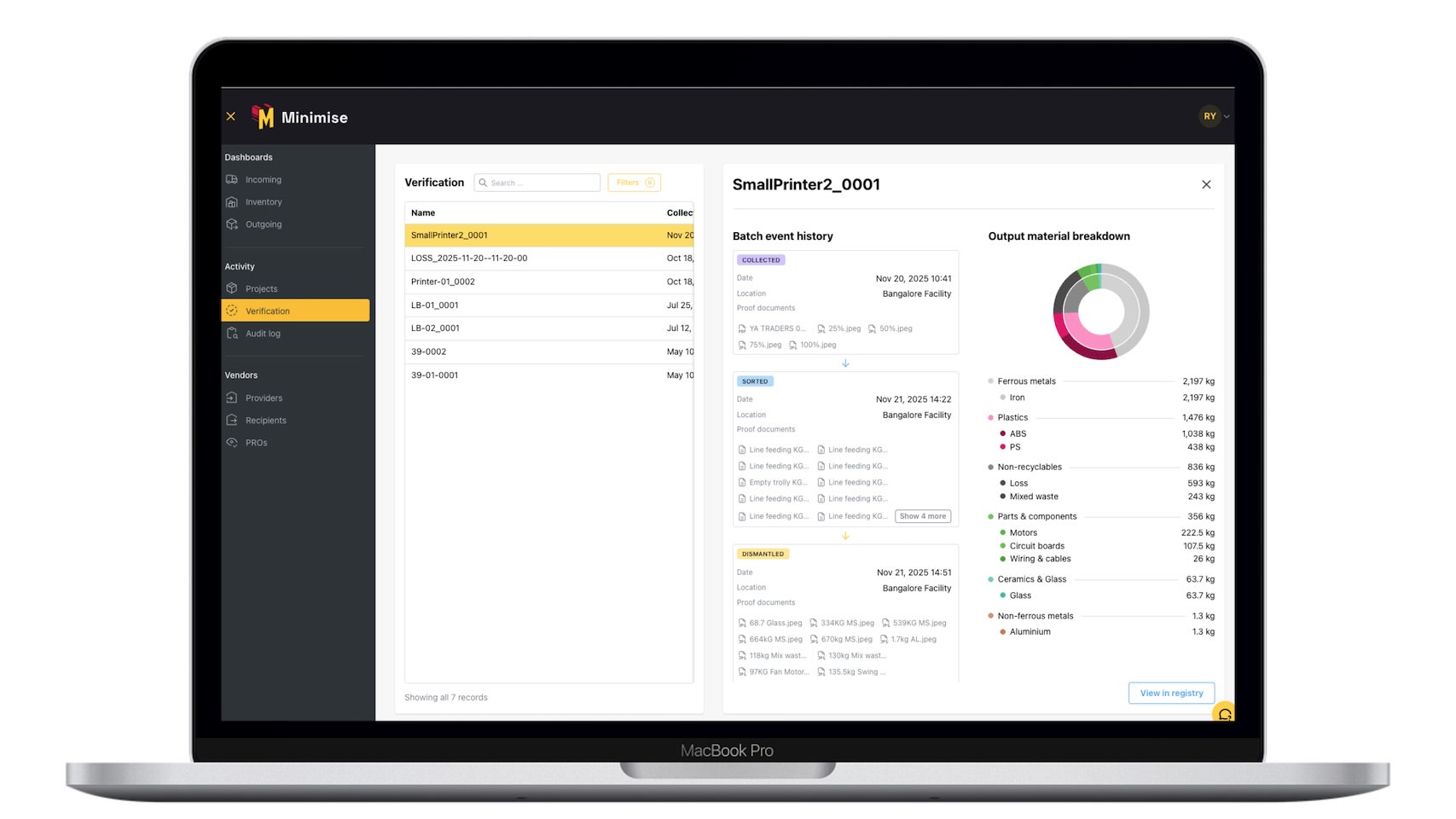 Verification interface on a laptop screen displaying batch event history and material breakdown charts for e-waste